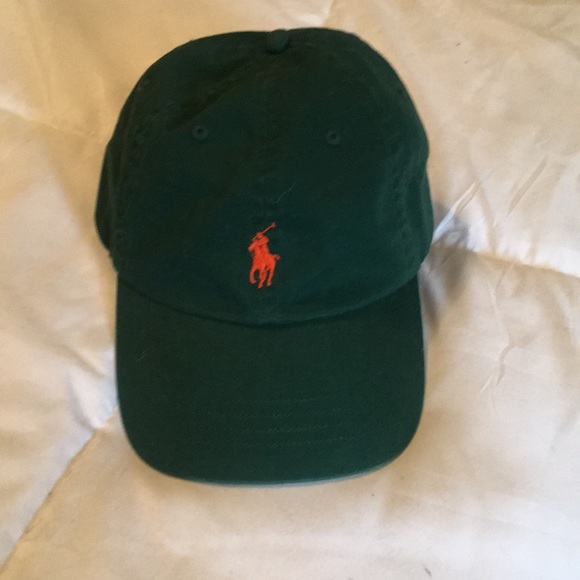 green and orange polo hat